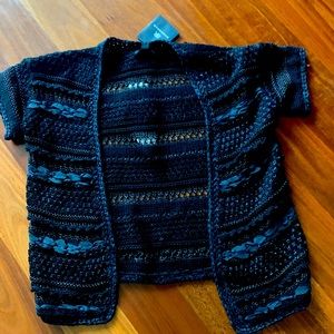 Banana republic monogram black shrug / cardigan. Perfect over a dress. NWT